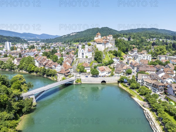 Aarburg town on the river Aare with church and fortress Aerial view from above in Aarburg, Switzerland