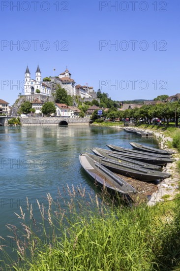 Aarburg town on the River Aare with church, fortress and boats in Aarburg, Switzerland