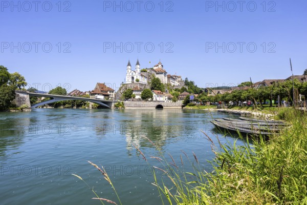 Aarburg town on the River Aare with church, fortress and boats in Aarburg, Switzerland