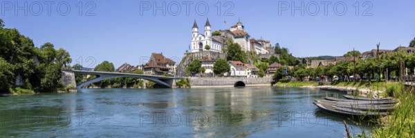 Aarburg town on the river Aare with church, fortress and boats panorama in Aarburg, Switzerland
