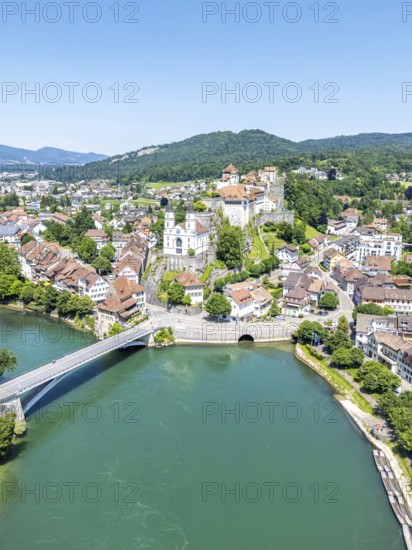 Aarburg town on the river Aare with church and fortress Aerial view from above in Aarburg, Switzerland