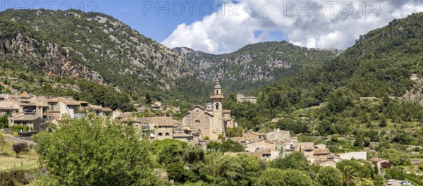 Valldemossa village on Majorca with church panoramic holiday at the Serra de Tramuntana trip in Valldemossa, Spain