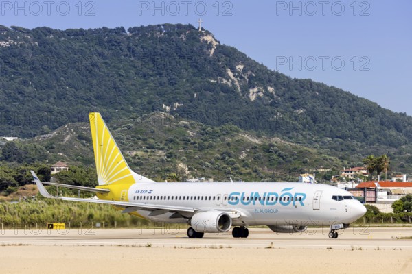 A Boeing 737-800 Sun d'Or aircraft with the registration number 4X-EKR at Rhodes Airport, Greece