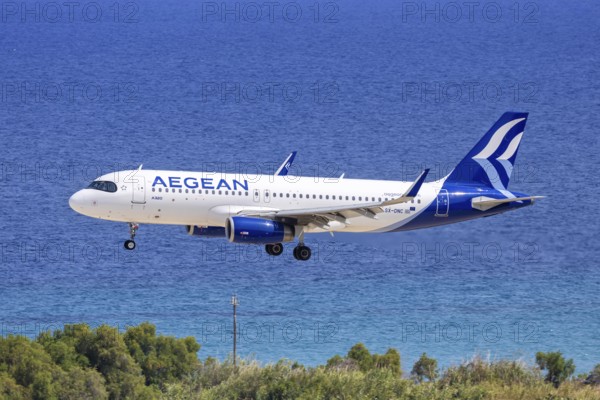 An Airbus A320 aircraft of Aegean Airlines with the registration SX-DNC at Rhodes Airport, Greece