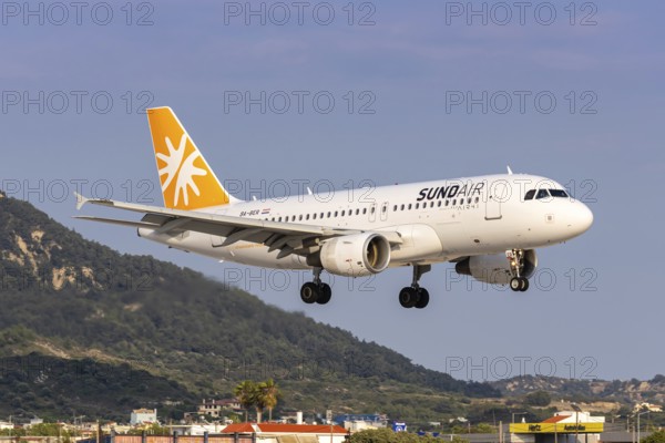 A Sundair Airbus A319 aircraft with the registration 9A-BER at Rhodes Airport, Greece
