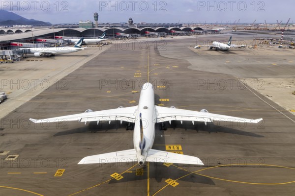 A Lufthansa Airbus A340-600 aircraft with the registration D-AIHW at Chek Lap Kok Airport (HKG) in Hong Kong, China
