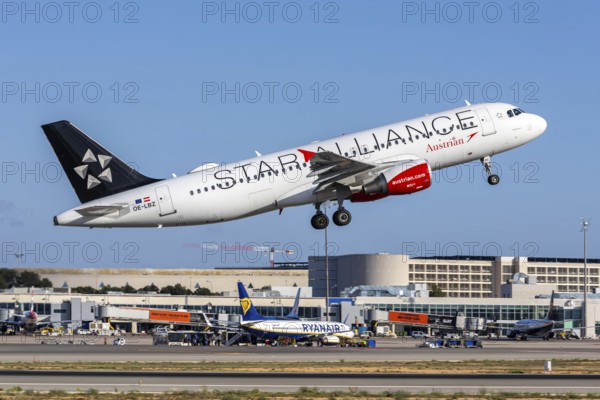 An Austrian Airlines Airbus A320 aircraft with the registration number OE-LBZ and the Star Alliance special livery at Palma de Majorca Airport, Spain