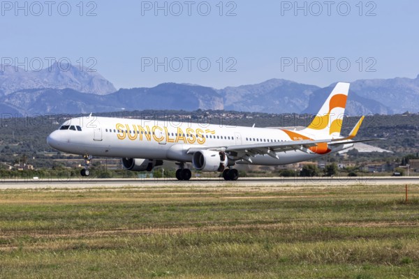 A Sunclass Airlines Airbus A321 aircraft with the registration number OY-TCI at Palma de Majorca Airport, Spain