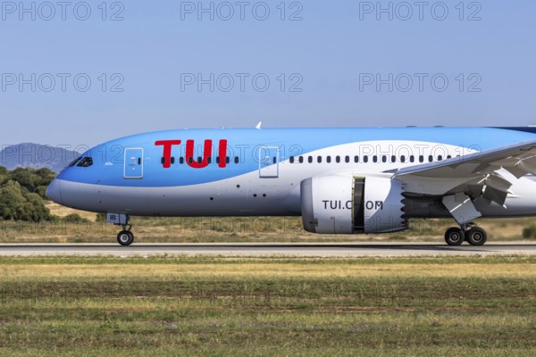 A TUI Boeing 787-8 Dreamliner aircraft with the registration G-TUIB at Palma de Majorca Airport, Spain