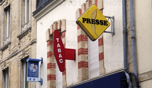 Typical sign of a shop for tobacco, press, magazines, gambling, old town, Bayeux, Normandy, Calvados, France