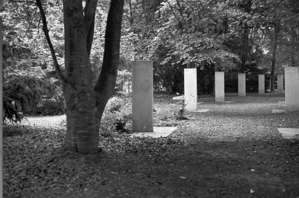 Stelae at the Mémorial des Réporters, memorial to the freedom of the press, memorial to journalists and photographers killed in the line of duty, black and white, Bayeux, Normandy, Calvados, France