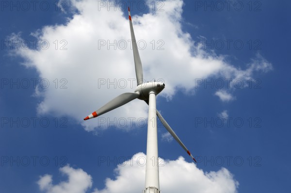 Wind turbine against cloudy sky, Karsberg, Upper Franconia, Bavaria, Germany