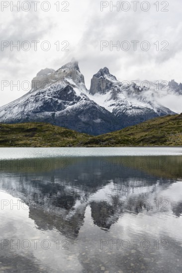 Cuernos del Paine mountain range, reflection in Lago Nordenskjöld, Torres del Paine National Park, Chile