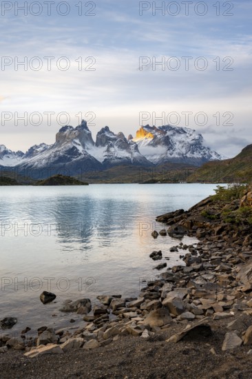 Cuernos del Paine mountain range at sunset, reflection in Lago Pehoe, Torres del Paine National Park, Chile