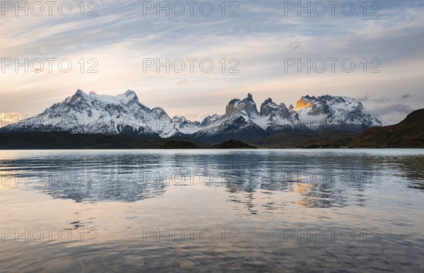 Cuernos del Paine mountain range at sunset, reflection in Lago Pehoe, Torres del Paine National Park, Chile