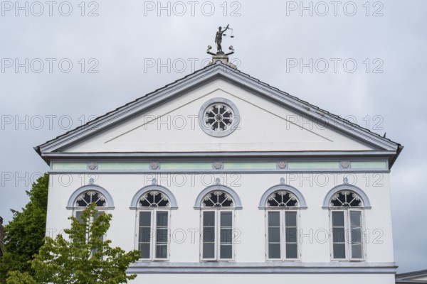 Building on the market square, figure of Justitia on the roof ridge, Old Town, Tönning, North Frisia, Schleswig-Holstein, Germany