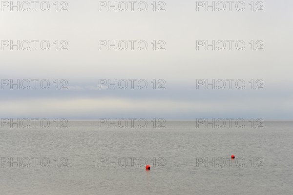 North Sea, red buoys in the Wadden Sea, Norddeich, Lower Saxony, Germany