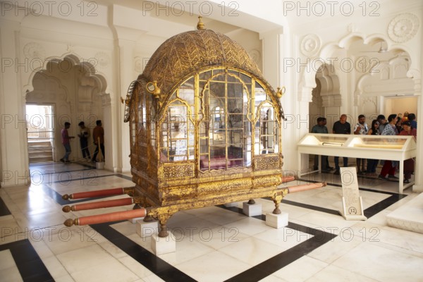 Golden palanquin in the Mehrangarh or Meherangarh fortress, Jodhpur, Rajasthan, India