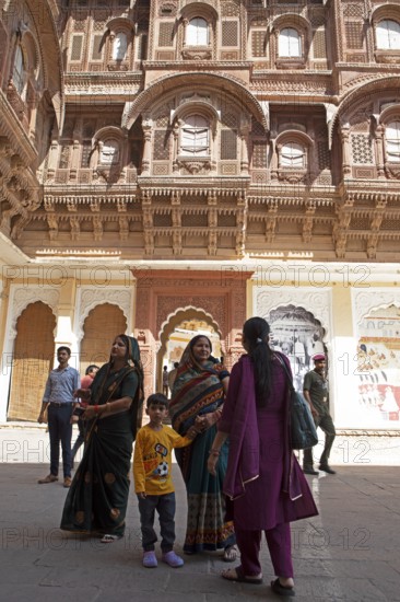 Indian woman in a courtyard of the Mehrangarh or Meherangarh fortress, Jodhpur, Rajasthan, India