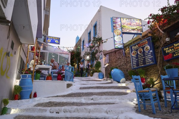Riga Fereou, Steps of Kos, famous alley, narrow staircase in picturesque alleyway with taverns and colourfully decorated ambience, Kos Town, Kos, Dodecanese, Greek Islands, Greece