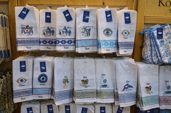 Ifestou Alley, Decorated kitchen towels with Greek motifs as souvenirs, Kos Town, Kos, Dodecanese, Greek Islands, Greece