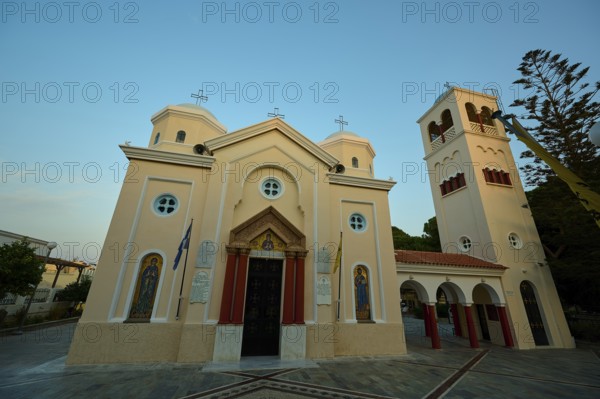 Church, Panagia Agia Paraskevi, Orthodox church with three towers and icons on the façade under a blue sky, Kos Town, Kos, Dodecanese, Greek Islands, Greece