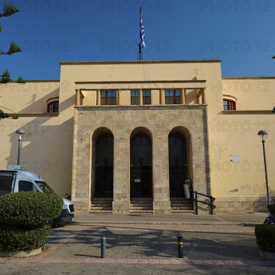 Archaeological Museum, Strict building with stone staircase and Greek flag, Kos Town, Kos, Dodecanese, Greek Islands, Greece