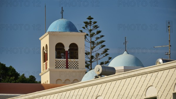Church, Panagia Agia Paraskevi, building with blue bell tower and dome, surrounded by antennas, Kos Town, Kos, Dodecanese, Greek Islands, Greece