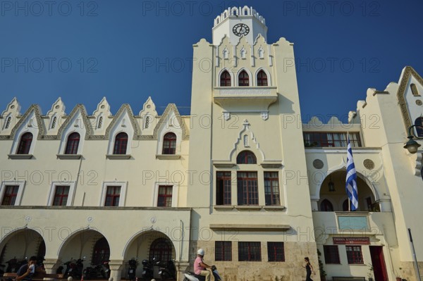 Palace of Justice, Colonial building, White building with clock tower and arches, framed by clear sky, Kos Town, Kos, Dodecanese, Greek Islands, Greece