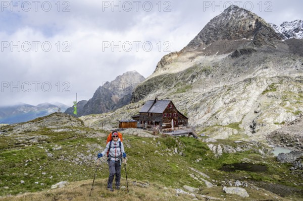 Hiker on the way to the Adolf Nossberger Hut, Schober Group, Hohe Tauern National Park, Carinthia, Austria