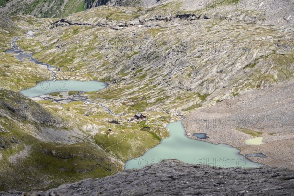 View of turquoise-blue mountain lake Großer Gradensee, Schober group, Hohe Tauern National Park, Carinthia, Austria