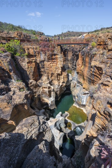 Bridges over a canyon with steep orange-coloured cliffs and the Blyde River, Bourke's Luck Potholes, Panorama Route, Mpumalanga, South Africa