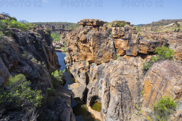 Bridges over a canyon with steep orange-coloured cliffs and the Blyde River, Bourke's Luck Potholes, Panorama Route, Mpumalanga, South Africa