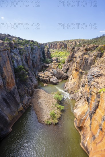 Canyon with steep orange-coloured cliffs with the Blyde River, Bourke's Luck Potholes, Panorama Route, Mpumalanga, South Africa