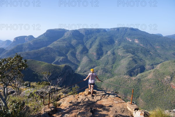Tourist at the viewpoint, view of the Blyde River gorge, Lowveld Viewpoint, in the evening light, canyon landscape, Blyde River Canyon, Panorama Route, Mpumalanga, South Africa