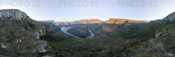 Sunset at Blyde River Canyon with Three Rondawels peak, view of canyon with Blyde River and table mountains in the evening light, canyon landscape, Panorama Route, Mpumalanga, South Africa