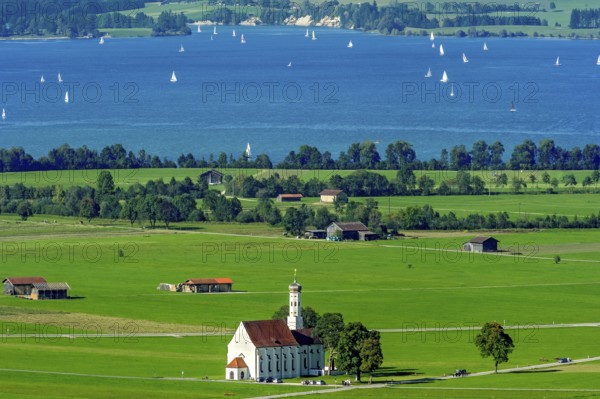 View from Neuschwanstein Castle to the pilgrimage church of St Coloman, Forggensee, Schwangau, Schwanengau plain, Königswinkel, Ostallgäu, Allgäu, Swabia, Bavaria, Germany