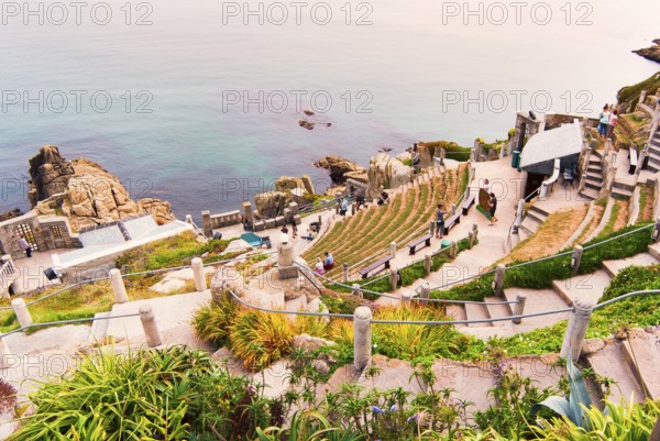 Minack Theatre, spectacular open-air theatre, circular path with lush planting, South England coast, Cornwall, England, GB