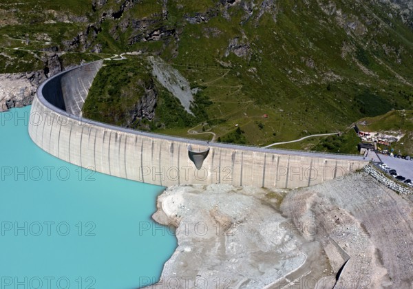 Impressive arch dam of the Moiry reservoir, Lac de Moiry, at low water in summer, Val d'Anniviers, Valais, Switzerland