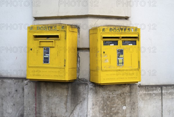 Two mailboxes, yellow, on the wall of a house, Épernay, Champagne, Marne, France