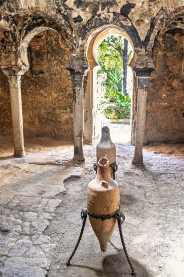 Interior at Banys Arabs Baths with old amphoras, a historic site with Islamic architecture, Palma de Mallorca, Mallorca, Spain