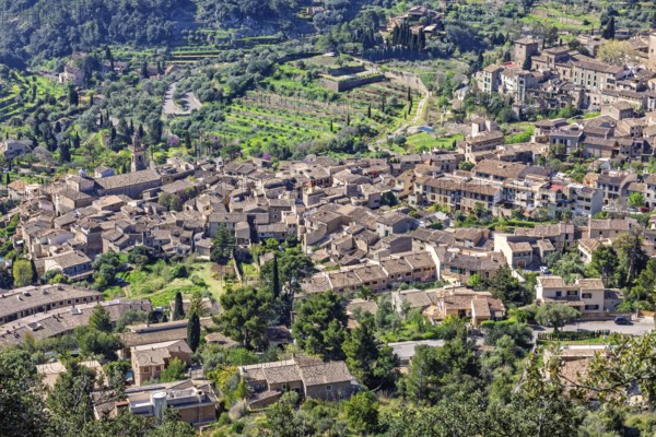 Aerial view at a mountain village with old houses in a valley, Valldemossa, Mallorca, Spain