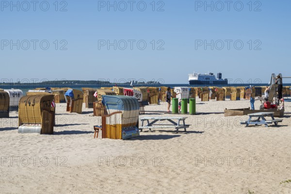 Beach chairs on sandy beach, ferry boat, Laboe, Baltic seaside resort, fjord, Baltic Sea, North Frisia, Schleswig-Holstein, Germany