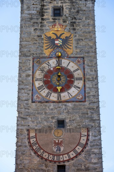 Colourful tower clock with coat of arms and sundial, Zwölferturm, historic old town, Sterzing, South Tyrol, Italy
