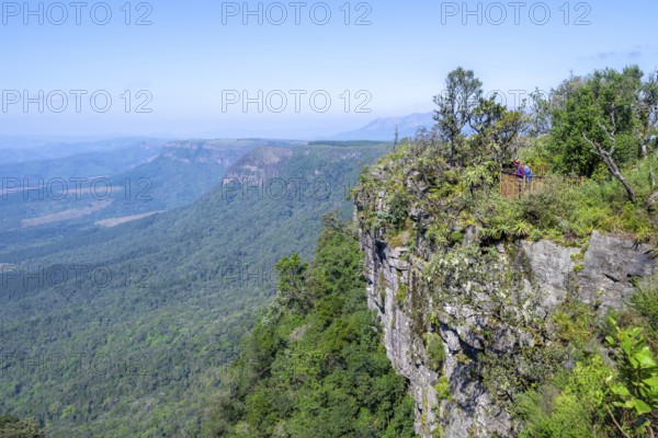Tourist on a viewing platform at the canyon, view at God's Window, canyon landscape, near Graskop, Mpumalanga, South Africa