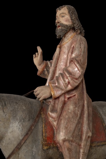 Palmesel, detail Jesus, St Briccius Church, on black background, Wurmlingen, district of Tuttlingen, Baden-Württemberg, Germany