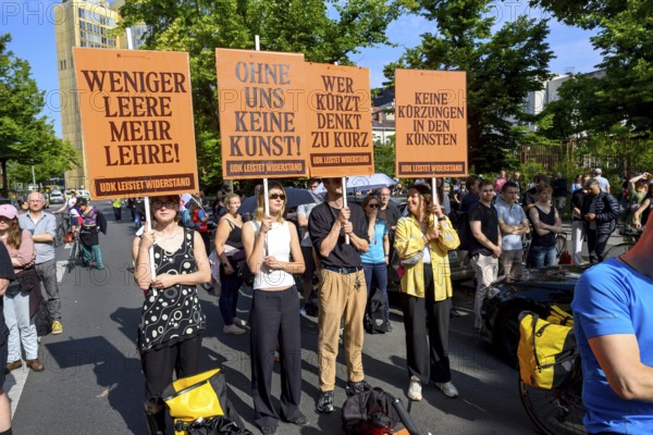 Protests by employees of Berlin's universities against the breach of contract and the cuts by the Berlin Senate. Employees of the University of the Arts with signs: Less emptiness more teaching! / No art without us! / Whoever cuts thinks too short / No cuts in the arts / UDK puts up resistance, Senate Department for Science, Berlin, 14.07.2025