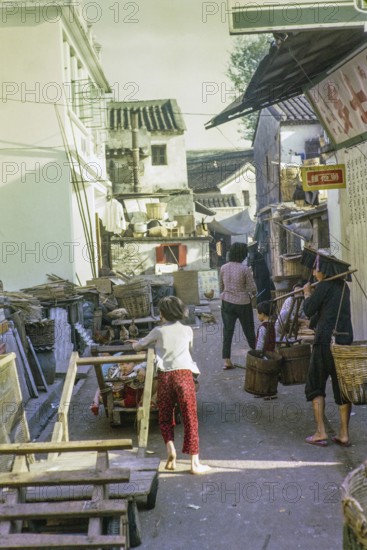 Activity in back alley street, Sai Kung, New Territories, Hong Kong, Asia 1965