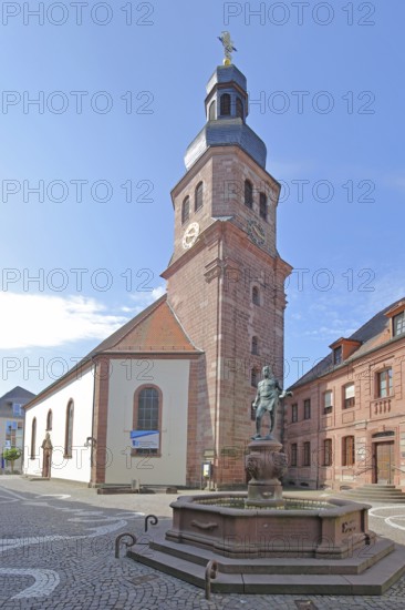 Baroque Luther Church built in 1758 and cobbler's fountain, sculpture, cobbler, symbol of former shoe industry, Pirmasens, Rhineland-Palatinate, Germany