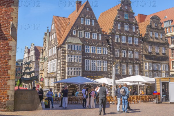 Bremen Town Musicians at the town hall, donkey, dog, cat, rooster, fairy tale by the Brothers Grimm, animal fable, literature, historic building with bay window, gabled houses, market square, old town, Hanseatic city of Bremen, Germany